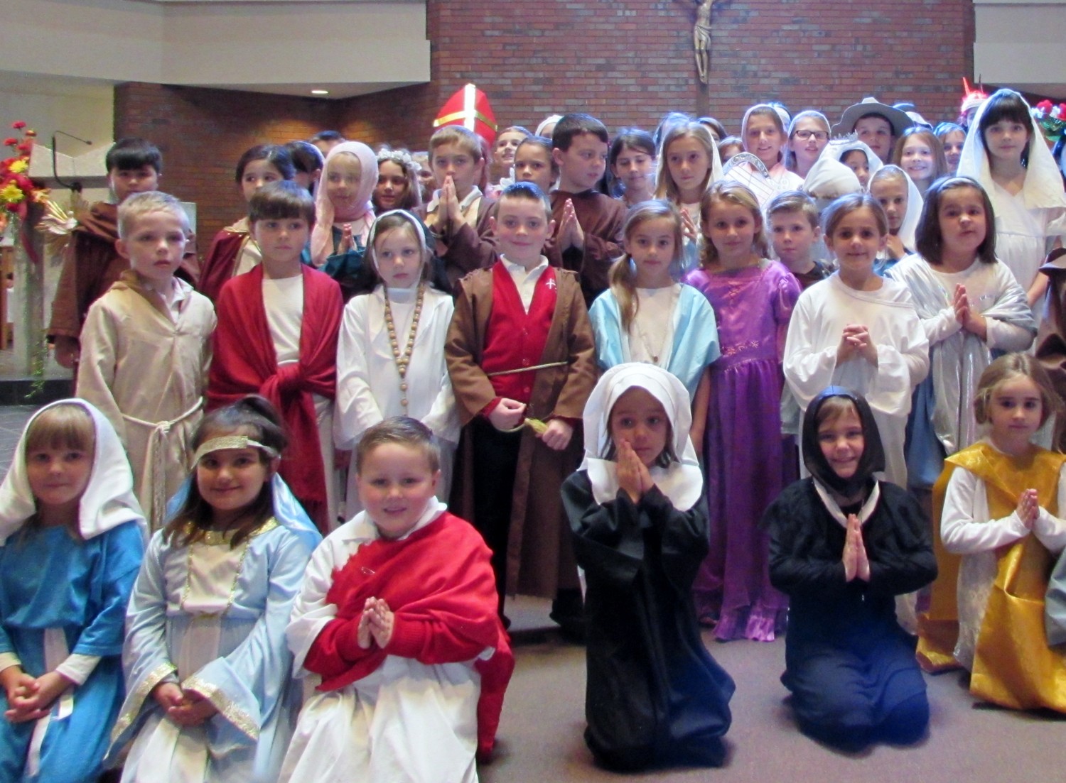 All Saints Day was a very special one at Saint Philip School in Greenville. To celebrate the day, many students researched the lives of saints, did special projects and created costumes to commemorate their saints. Students attended the All Saints Day Mass dressed as their saint of choice.